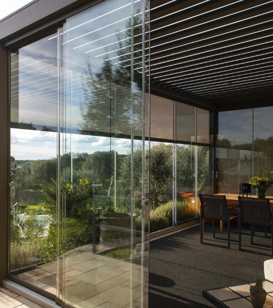 Comment relier votre jardin à votre maison grâce à une véranda en Isère ?